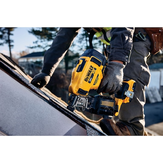 Cordless Coil Roofing Nailer in action on a roof