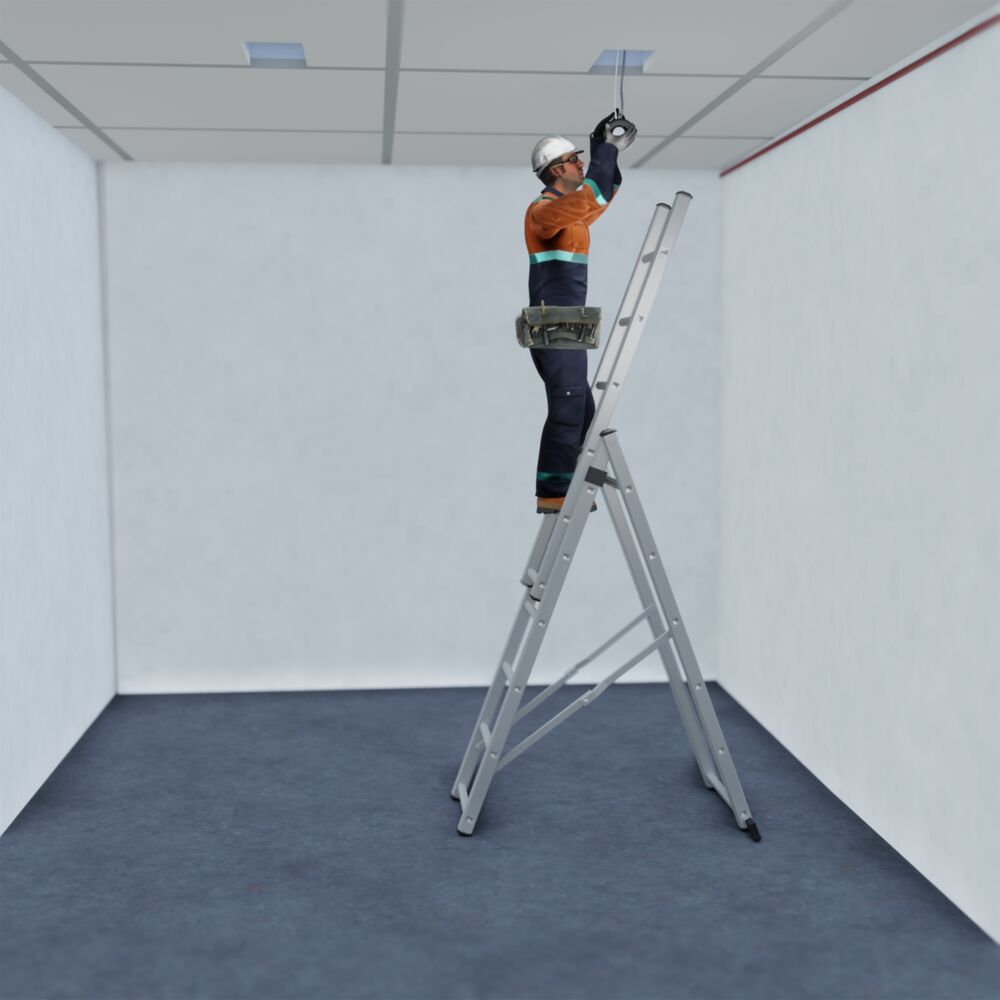 An electrician installing a device on the ceiling